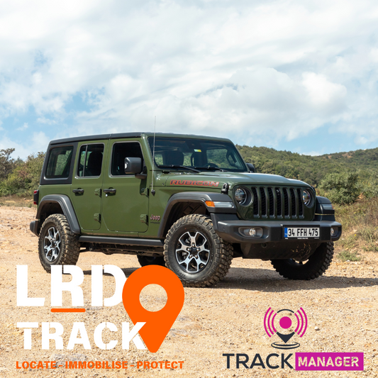 Jeep on dusty track with LRD Track Logo