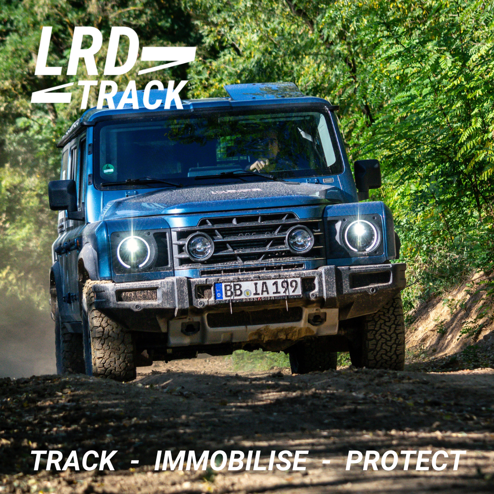 Ineos Grenadier driving down a track with LRD Track logo