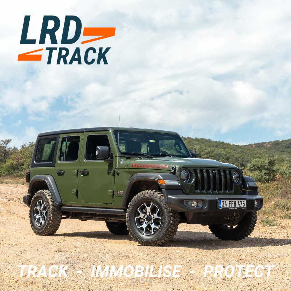 Green JEEP on a dirt track