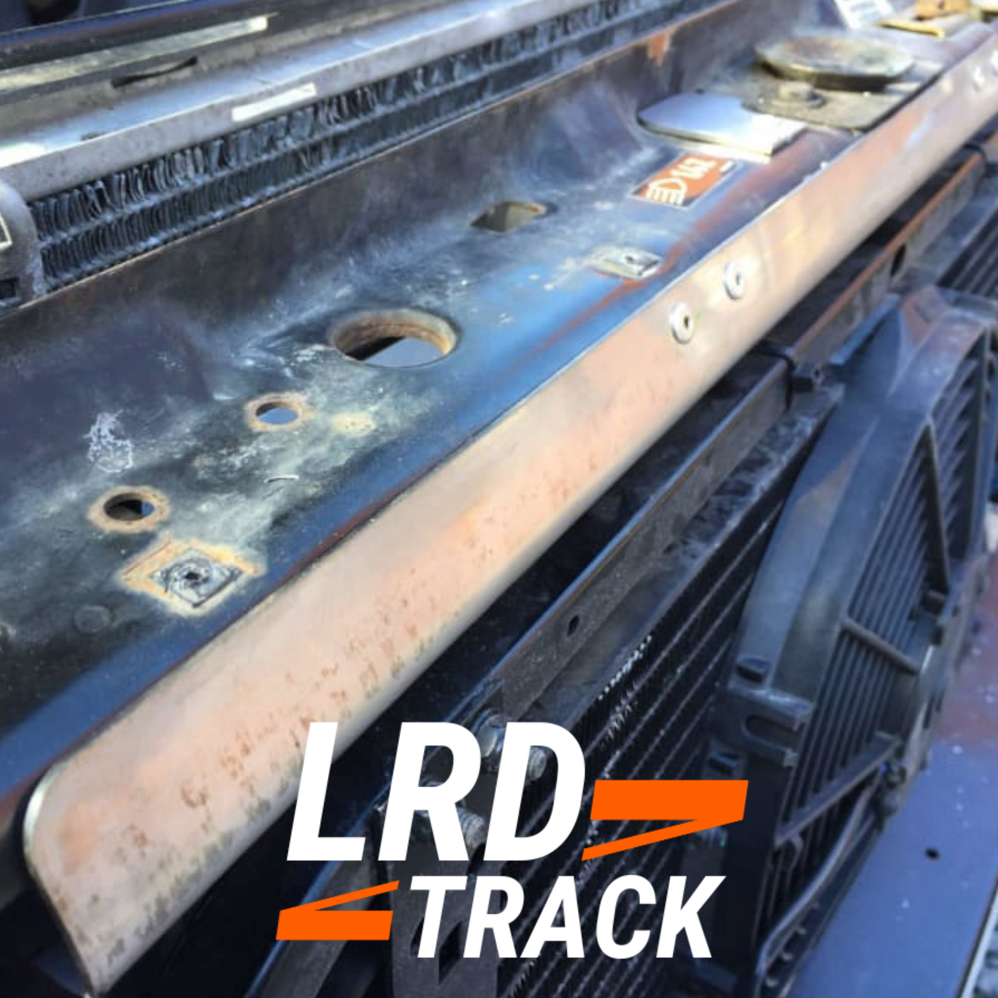 LRD Track logo with cable guard fitted to a defender in the background